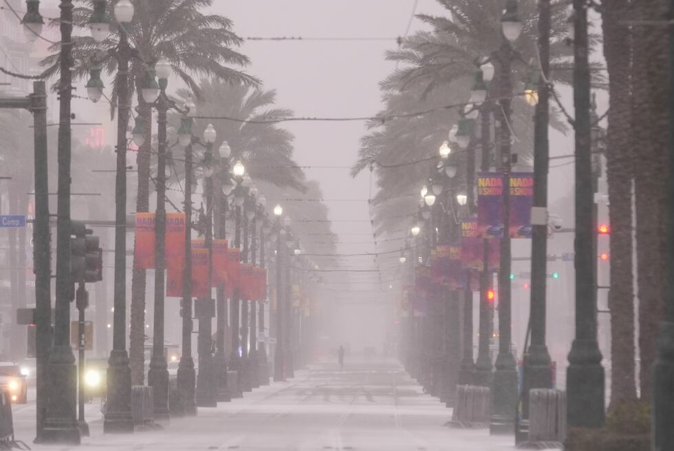 Snow covers Canal Street in downtown New Orleans, Tuesday, Jan. 21, 2025. (AP Photo/Gerald...