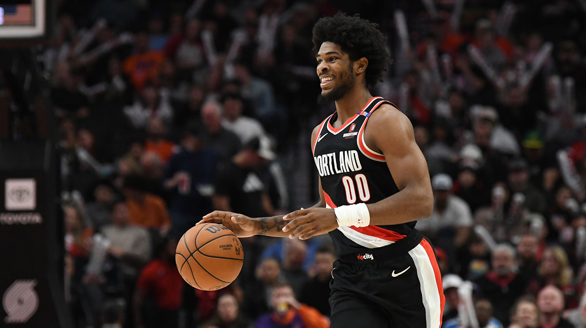 Portland Trailblazers guard Scoot Henderson (00) brings the ball up court against the Oklahoma City Thunder during the third quarter at Moda Center