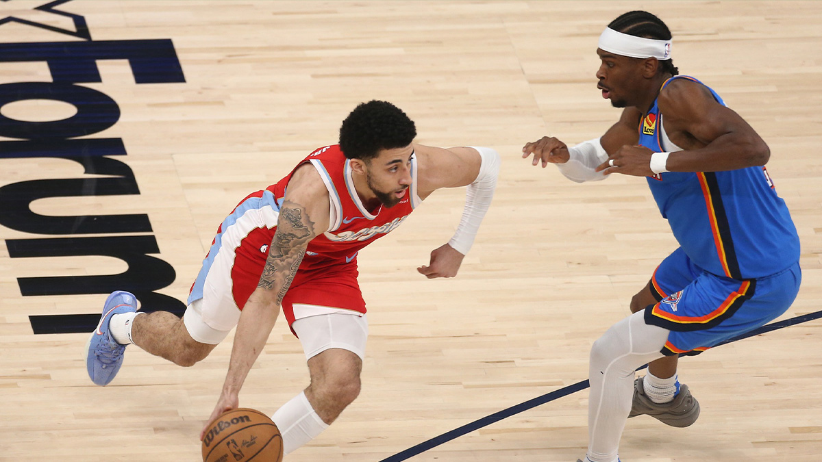 Memphis Grizzlies guard Scotty Pippen Jr. (1) drives to the basket as Oklahoma City Thunder guard Shai Gilgeous-Alexander (2) defends during the first quarter during game four for the first round of the 2024 NBA Playoffs at FedExForum.