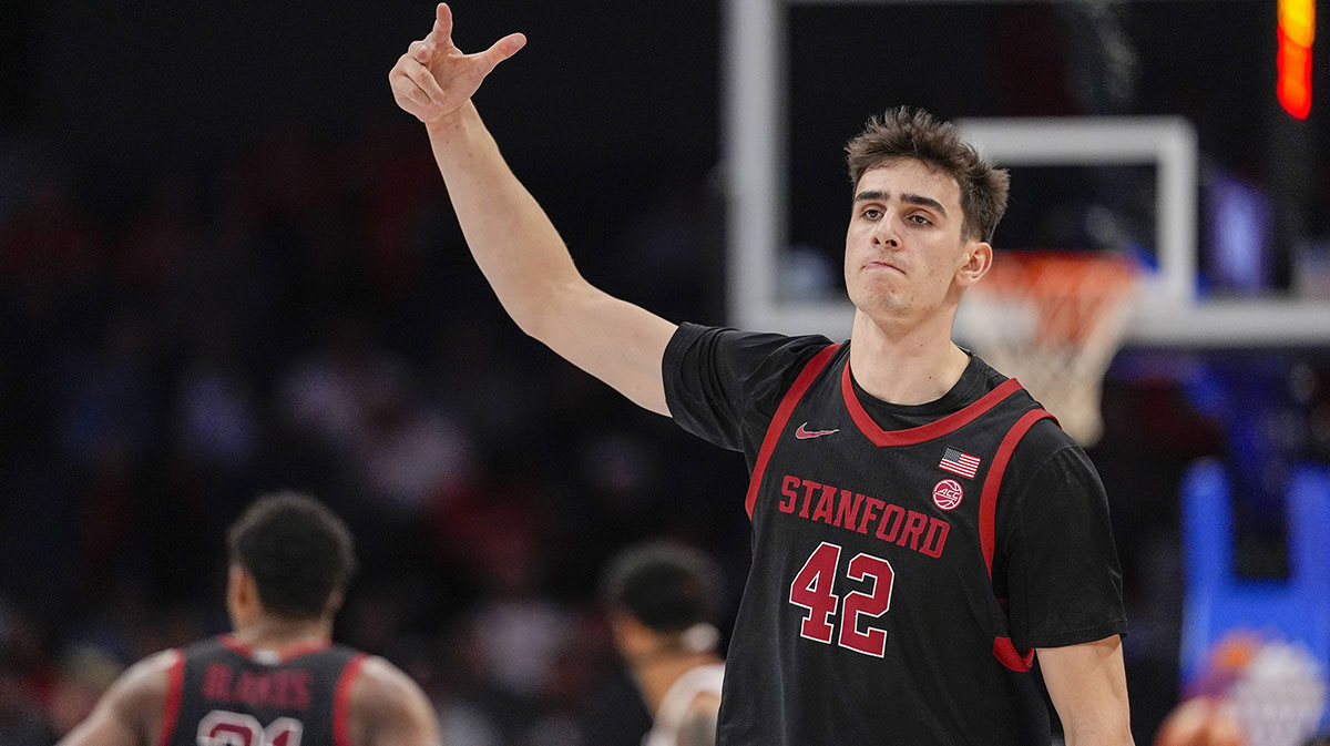 Stanford Cardinal forward Maxime Raynaud (42) after a dunk against the Louisville Cardinals during the second half at Spectrum Center.