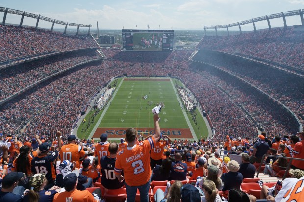 Denver Broncos fans cheer on the team during the season...