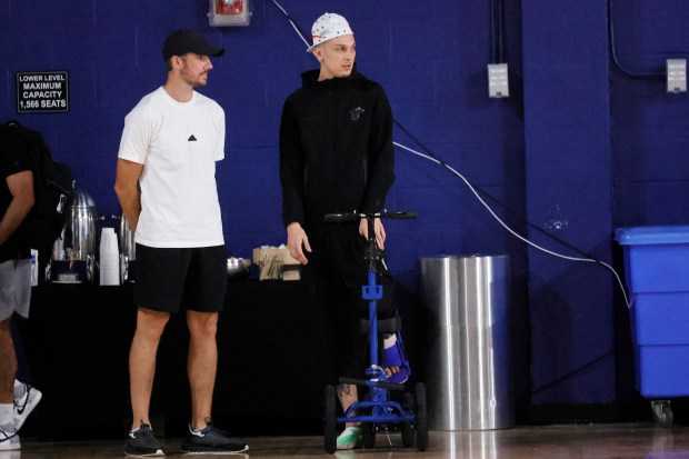 Miami Heat guard Tyler Herro is seen using a scooter...