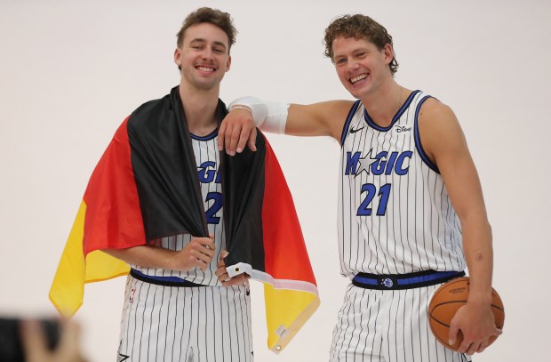 Orlando Magic brothers Franz Wagner (22) and Mo Wagner (21)...