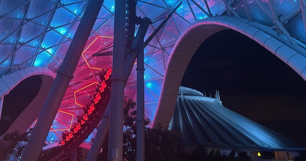 Magic Kingdom visitors experience the new look of Tron Lightcycle / Run on the first night of the roller coaster's overlay tied to "Tron: Ares," a film that debuts Oct. 10. (Dewayne Bevil/Orlando Sentinel)