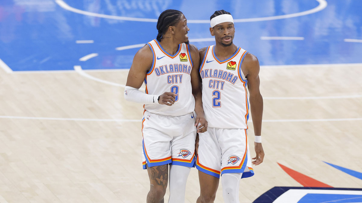 Thunder forward Jalen Williams (8) and guard Shai Gilgeous-Alexander (2) walk back up the court in the first quarter against the Indiana Pacers during game five of the 2025 NBA Finals at Paycom Center
