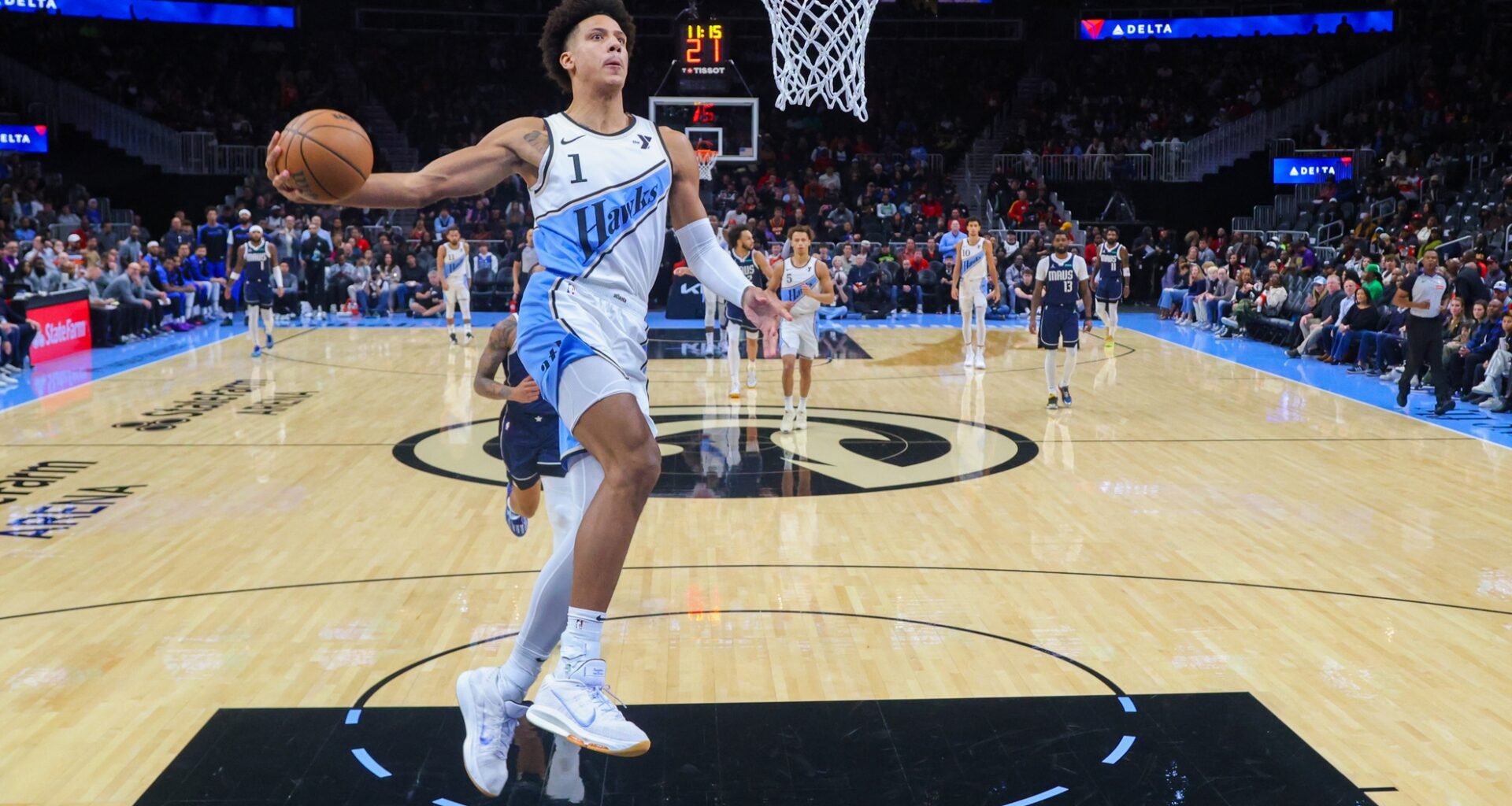 Nov 25, 2024; Atlanta, Georgia, USA; Atlanta Hawks forward Jalen Johnson (1) dunks against the Dallas Mavericks in the first half at State Farm Arena. Mandatory Credit: Brett Davis-Imagn Images