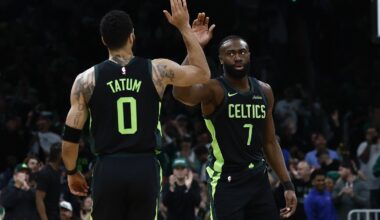 Feb 28, 2025; Boston, Massachusetts, USA; Boston Celtics guard Jaylen Brown (7) high fives forward Jayson Tatum (0) after the Cleveland Cavaliers called a timeout during the first quarter at TD Garden. Mandatory Credit: Winslow Townson-Imagn Images