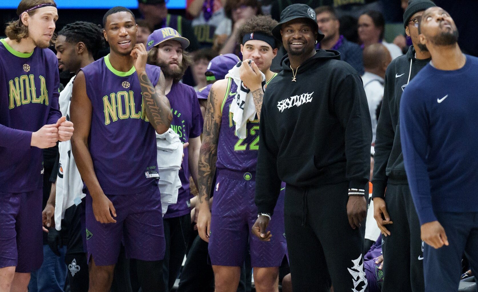 New Orleans Pelicans players on bench