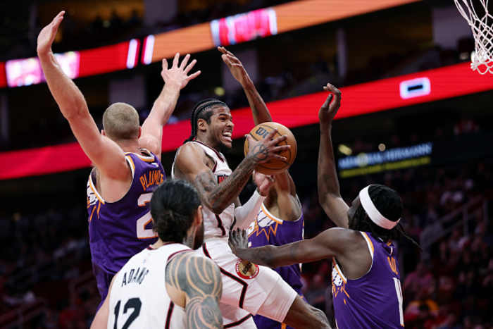 Strong scoring helps Rockets outlast Suns in shootout, 119-111