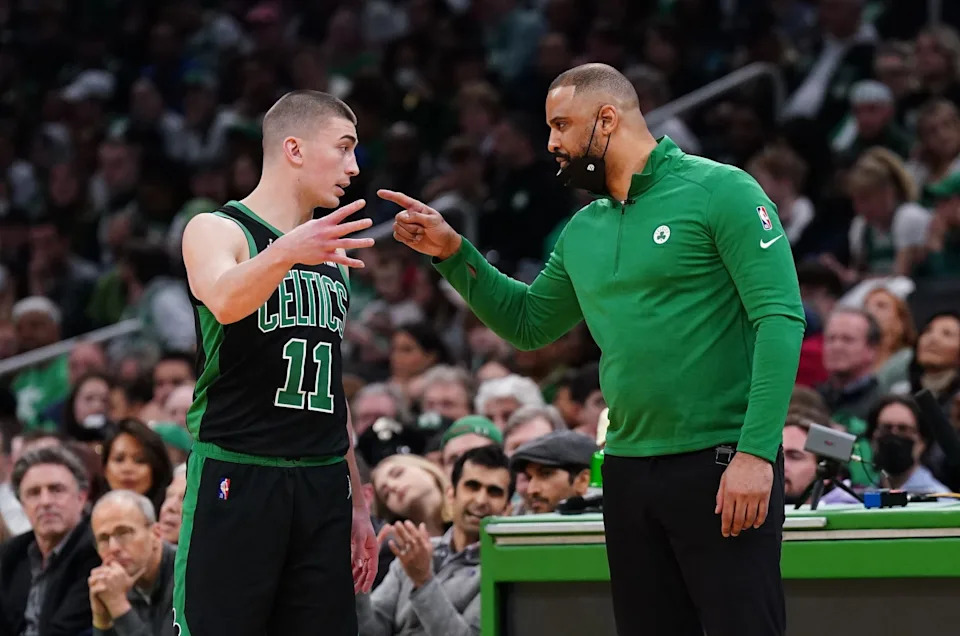 Apr 17, 2022; Boston, Massachusetts, USA; Boston Celtics head coach Ime Udoka talks with guard Payton Pritchard (11) from the sideline as they take on the Brooklyn Nets in the first quarter during game one of the first round for the 2022 NBA playoffs at TD Garden. Mandatory Credit: David Butler II-USA TODAY Sports