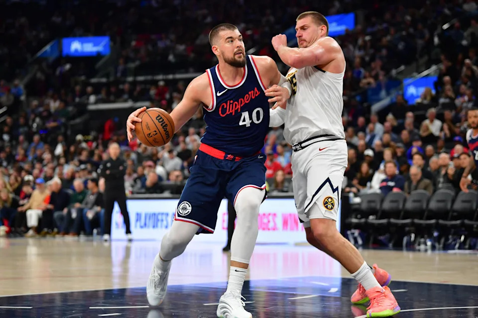Apr 24, 2025; Inglewood, California, USA; Los Angeles Clippers center Ivica Zubac (40) moves to the basket against Denver Nuggets center Nikola Jokic (15) during the second half of game three in the first round for the 2024 NBA Playoffs at Intuit Dome. Mandatory Credit: Gary A. Vasquez-Imagn Images