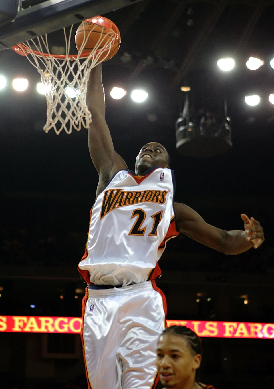 OAKLAND, CA - NOVEMBER 2: Chris Taft #21 of the Golden State Warriors shoots over Tyronn Lue #10 of the Atlanta Hawks at the Arena in Oakland on November 2, 2005 in Oakland, California. The Warriors defeated the Hawks 122-97. NOTE TO USER: User expressly acknowledges and agrees that, by downloading and/or using this Photograph, user is consenting to the terms and conditions of the Getty Images License Agreement. (Photo by Jed Jacobsohn/Getty Images)