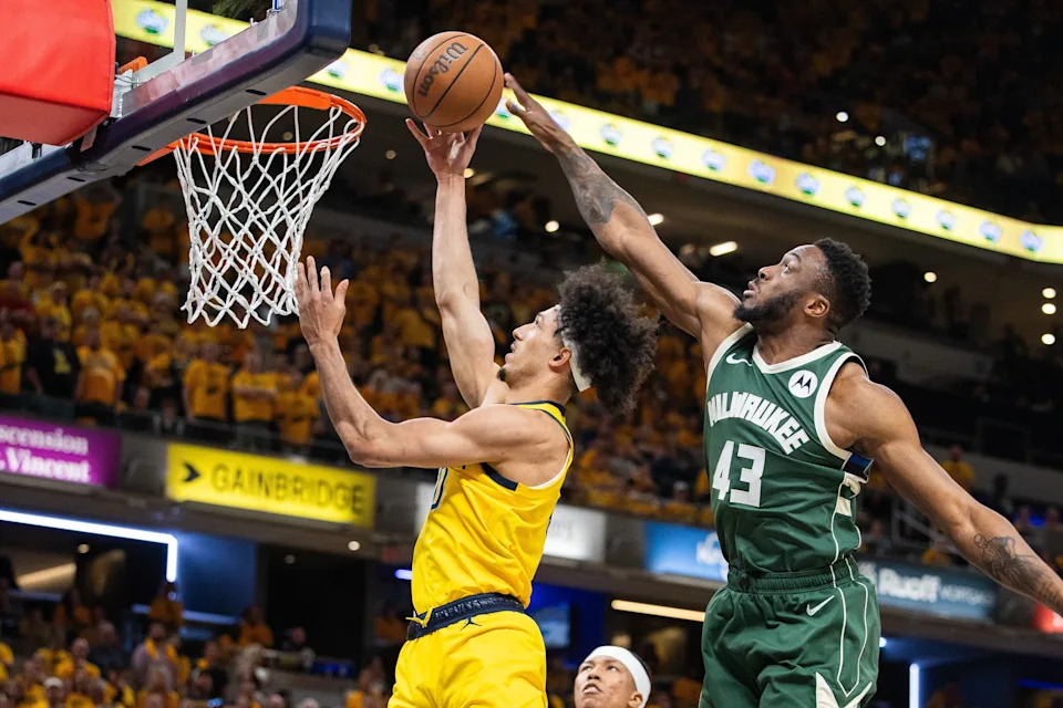 May 2, 2024; Indianapolis, Indiana, USA; Indiana Pacers guard Kendall Brown (10) shoots the ball while Milwaukee Bucks forward Thanasis Antetokounmpo (43) defends during game six of the first round for the 2024 NBA playoffs at Gainbridge Fieldhouse. Mandatory Credit: Trevor Ruszkowski-USA TODAY Sports