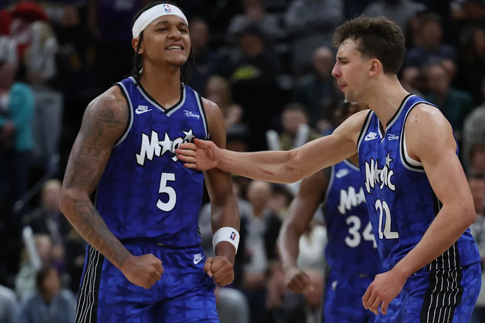 Orlando Magic forward Paolo Banchero (5) reacts with forward Franz Wagner (22).Rob Gray-Imagn Images