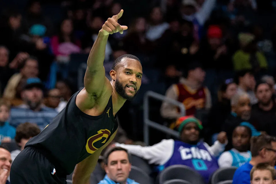 Dec 7, 2024; Charlotte, North Carolina, USA; Cleveland Cavaliers forward Evan Mobley (4) celebrates a three point basket against the Charlotte Hornets during the fourth quarter at Spectrum Center. Mandatory Credit: Scott Kinser-Imagn Images