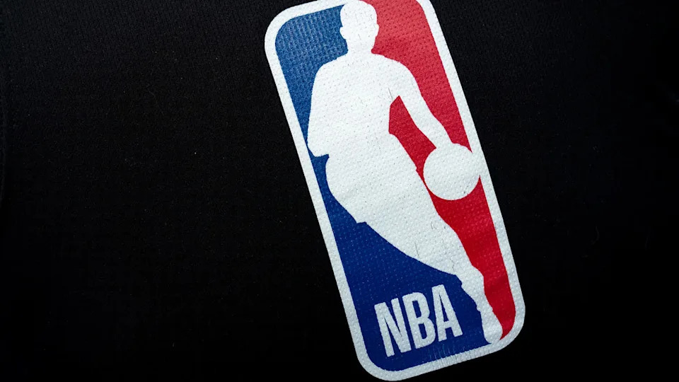 NBA logo with silhouette of a basketball player