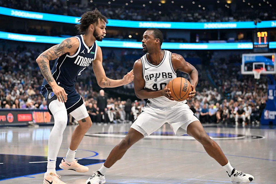 Oct 24, 2024; Dallas, Texas, USA; San Antonio Spurs forward Harrison Barnes (40) looks to shoot over Dallas Mavericks center Dereck Lively II (2) during the first quarter at the American Airlines Center. Mandatory Credit: Jerome Miron-Imagn Images