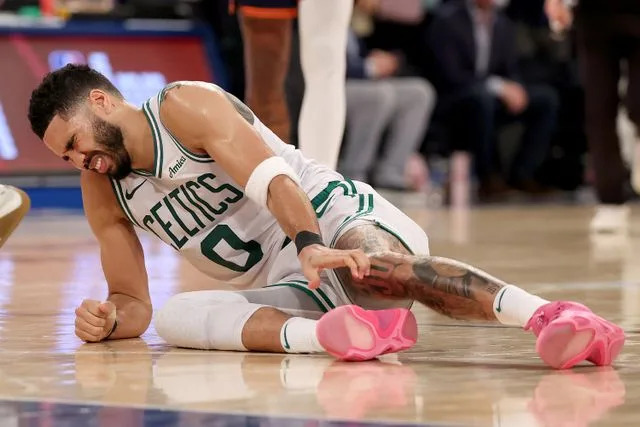 Elsa/Getty Boston Celtic's star Jayson Tatum ruptured his right Achilles tendon during the NBA Playoffs on May 12
