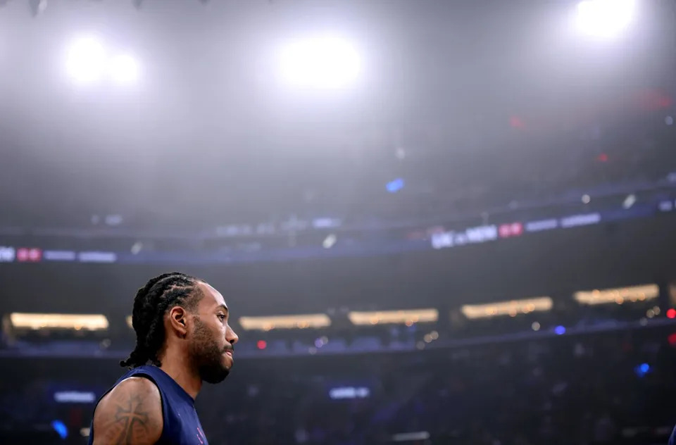 Kawhi Leonard stands in the Intuit Dome.