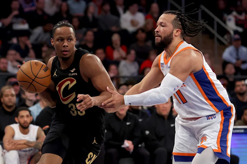 Apr 11, 2025; New York, New York, USA; Cleveland Cavaliers forward Isaac Okoro (35) brings the ball up court against New York Knicks guard Jalen Brunson (11) during the first quarter at Madison Square Garden. Mandatory Credit: Brad Penner-Imagn Images