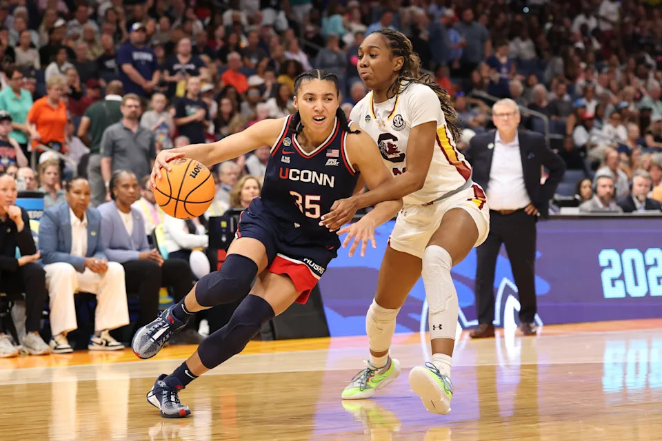 TAMPA, FLORIDA - APRIL 06: Azzi Fudd #35 of the UConn Huskies dribbles the ball while being guarded by Maryam Dauda #30 of the South Carolina Gamecocks in the third quarter in the National Championship of the NCAA Women's Basketball Tournament at Amalie Arena on April 06, 2025 in Tampa, Florida. (Photo by Maddie Meyer/Getty Images)