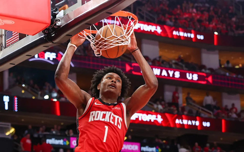 Apr 30, 2025; Houston, Texas, USA; Houston Rockets forward Amen Thompson (1) dunks against the Golden State Warriors in the fourth quarter during game five of first round for the 2025 NBA Playoffs at Toyota Center. Mandatory Credit: Thomas Shea-Imagn Images