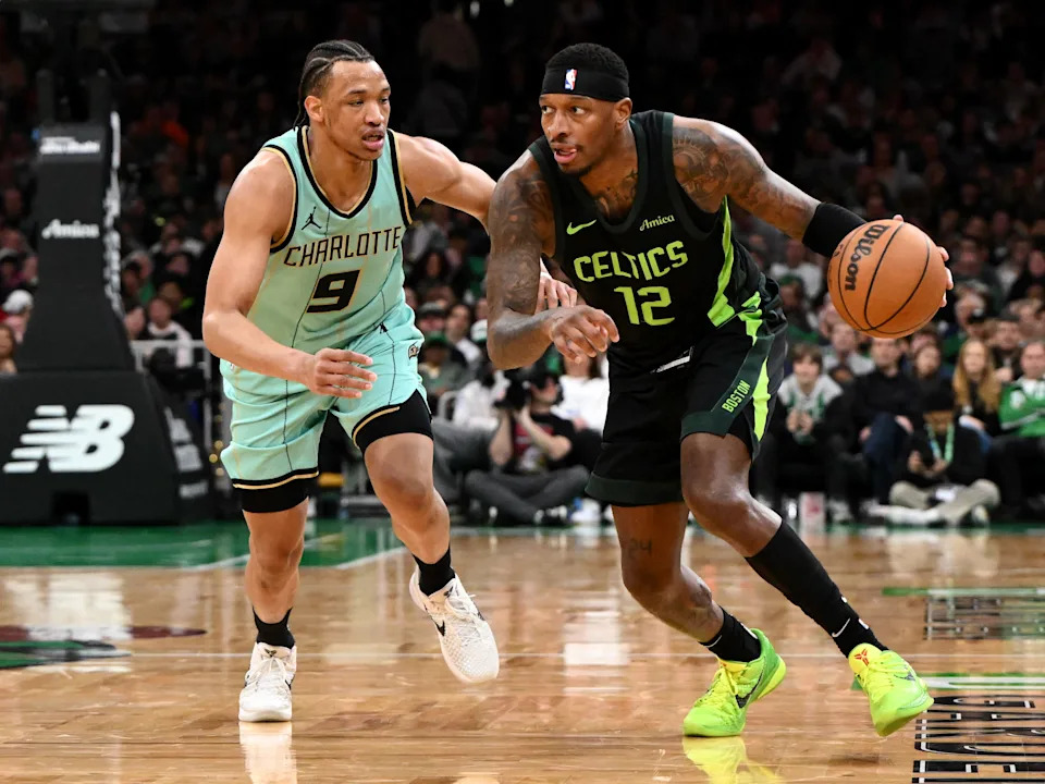 BOSTON, MASSACHUSETTS - APRIL 13: Torrey Craig #12 of the Boston Celtics dribbles the ball against Wendell Moore Jr. #9 of the Charlotte Hornets during first half at the TD Garden on April 13, 2025 in Boston, Massachusetts. NOTE TO USER: User expressly acknowledges and agrees that, by downloading and or using this photograph, User is consenting to the terms and conditions of the Getty Images License Agreement. (Photo by Brian Fluharty/Getty Images)
