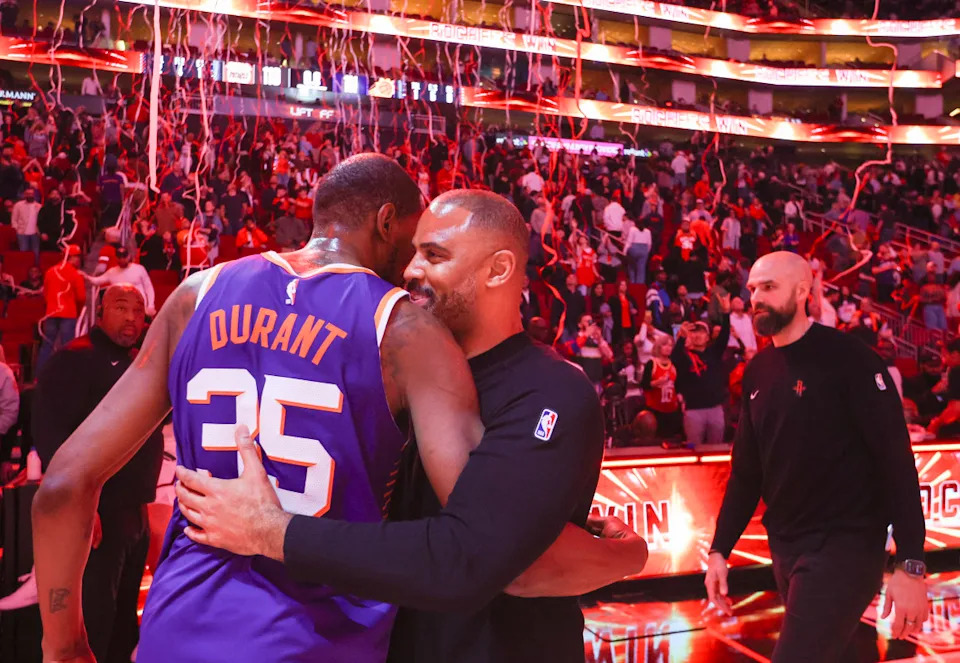 Feb 12, 2025; Houston, Texas, USA; Phoenix Suns forward Kevin Durant (35) hugs Houston Rockets head coach Ime Udoka after a game at Toyota Center. Mandatory Credit: Thomas Shea-Imagn Images: Thomas Shea-Imagn Images