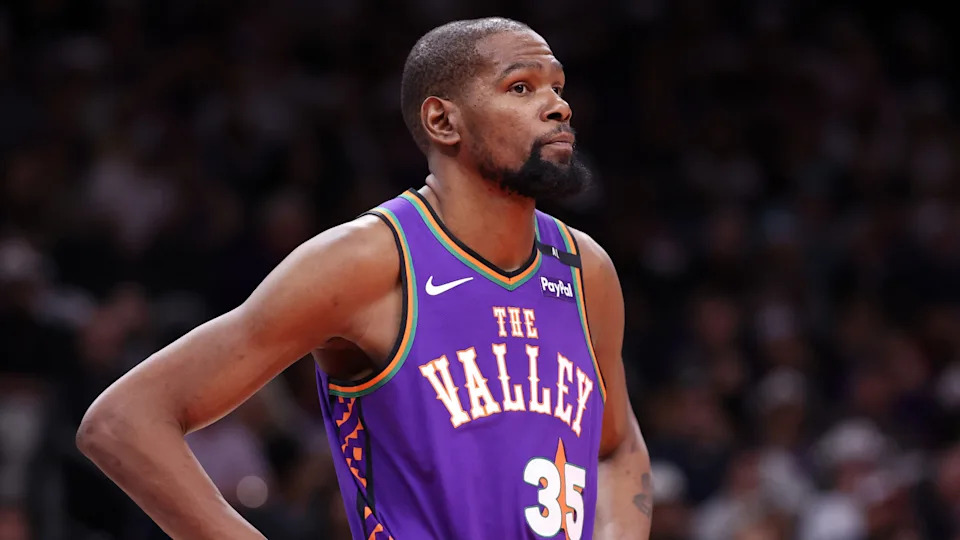 Kevin Durant in a purple basketball jersey with 