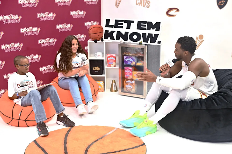 Cleveland Cavaliers guard Donovan Mitchell talks to kids club reporters during media day Sept. 29, 2025, at Rocket Arena in Cleveland.