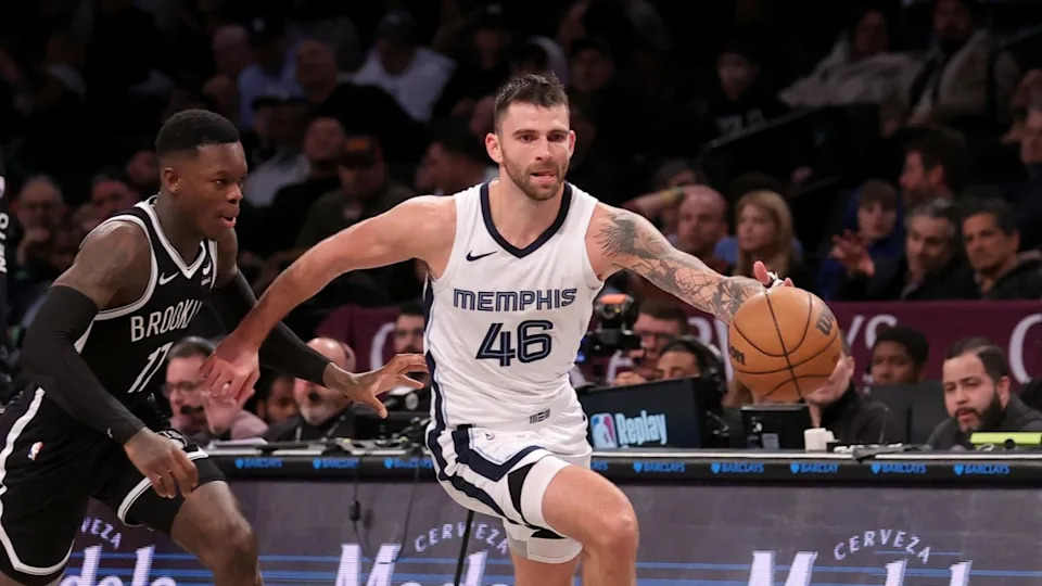 Memphis Grizzlies guard John Konchar (46) brings the ball up court against Brooklyn Nets guard Dennis Schroder (17)© Brad Penner-Imagn Images