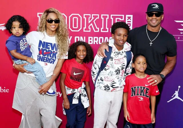 Jamie McCarthy/Getty Ciara and Russell Wilson pose with their kids at Macy's x Rookie Kids: 
