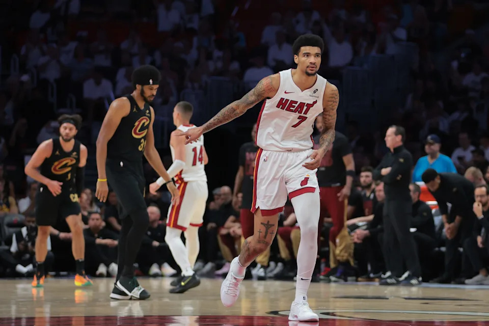 Apr 26, 2025; Miami, Florida, USA; Miami Heat center Kel'el Ware (7) signals after scoring against the Cleveland Cavaliers in the first quarter during game three for the first round of the 2025 NBA Playoffs at Kaseya Center. Mandatory Credit: Sam Navarro-Imagn Images