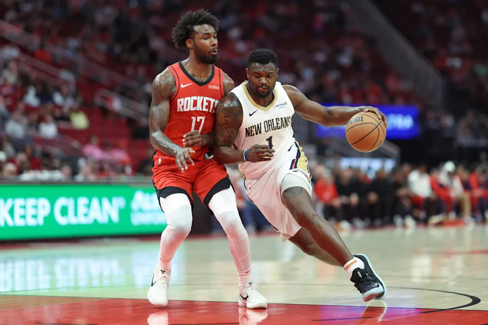 Mar 8, 2025; Houston, Texas, USA; New Orleans Pelicans forward Zion Williamson (1) drives with the ball as Houston Rockets forward Tari Eason (17) defends during the first quarter at Toyota Center. Mandatory Credit: Troy Taormina-Imagn Images