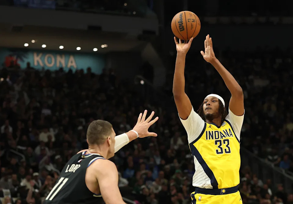 MILWAUKEE, WISCONSIN - APRIL 27: Myles Turner #33 of the Indiana Pacers shoots the ball over Brook Lopez #11 of the Milwaukee Bucks during the first quarter in Game Four of the Eastern Conference First Round NBA Playoffs at Fiserv Forum on April 27, 2025 in Milwaukee, Wisconsin. NOTE TO USER: User expressly acknowledges and agrees that, by downloading and or using this photograph, User is consenting to the terms and conditions of the Getty Images License Agreement. (Photo by Stacy Revere/Getty Images)