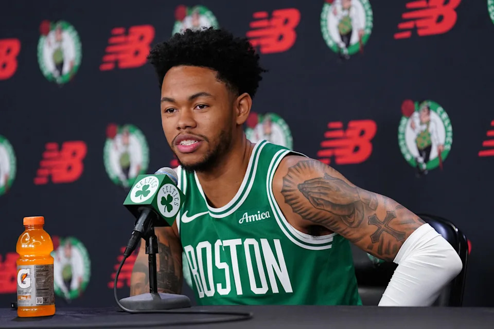 Sep 29, 2025; Boston, MA, USA; Boston Celtics guard Anfernee Simons (4) talks with reporters during media day at the Auerbach Center. Mandatory Credit: David Butler II-Imagn Images