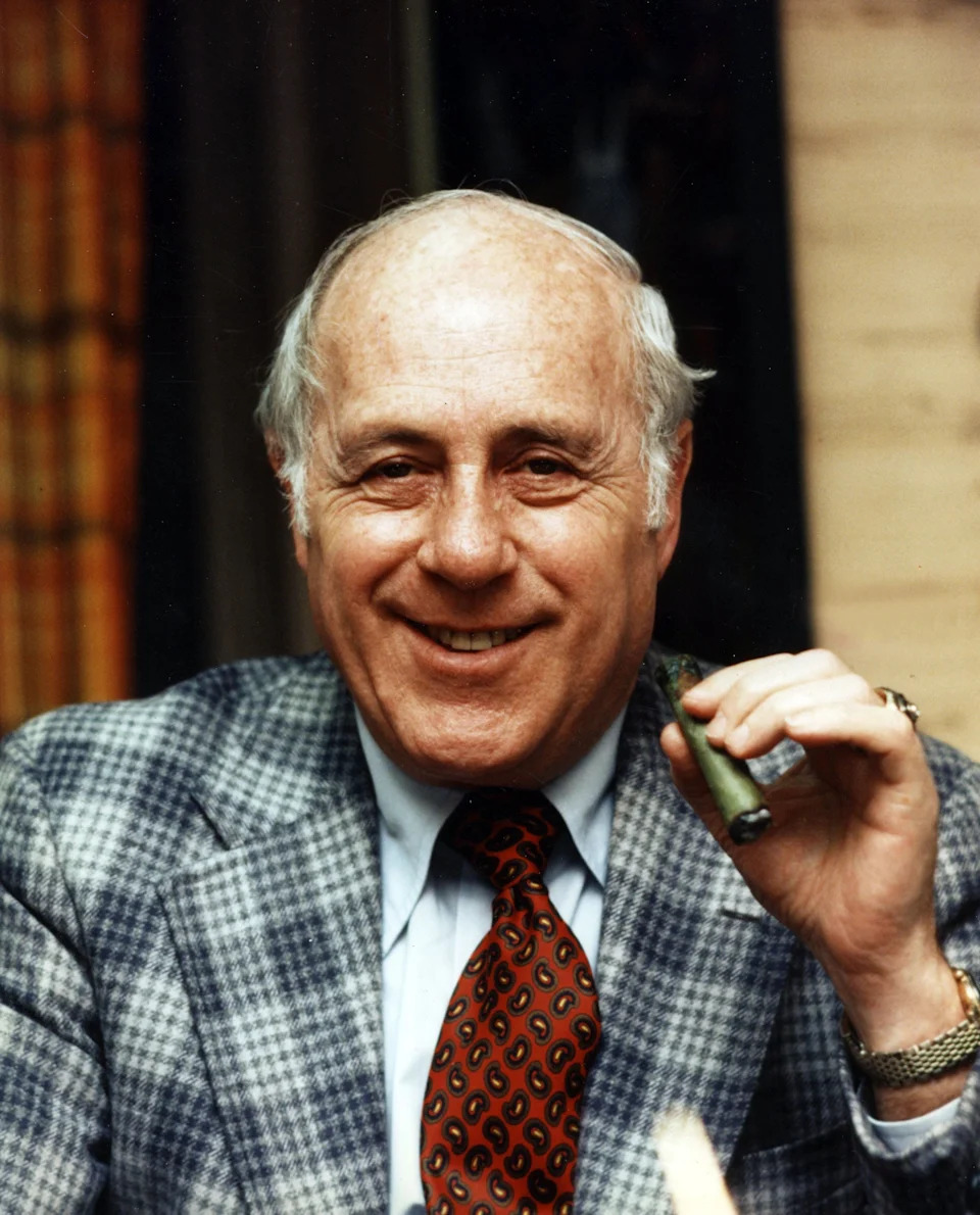 Unknown Date; Boston, MA, USA; FILE PHOTO; Boston Celtics former head coach Red Auberbach in his office during the mid 1980's. Mandatory Credit: Dick Raphael-USA TODAY Sports
