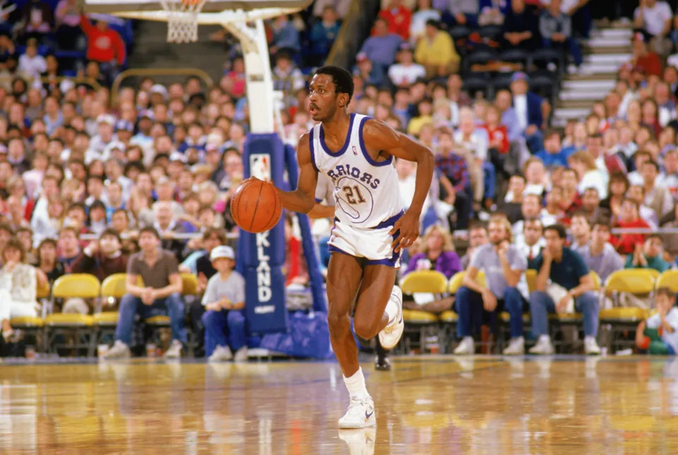 1988: Eric Sleepy Floyd #21 of the Golden State Warriors drives upcourt during an NBA game in the 1988-89 season. NOTE TO USER: User expressly acknowledges and agrees that, by downloading and/or using this Photograph, User is consenting to the terms and conditions of the Getty Images License Agreement. (Photo by: Otto Greule Jr/Getty Images
