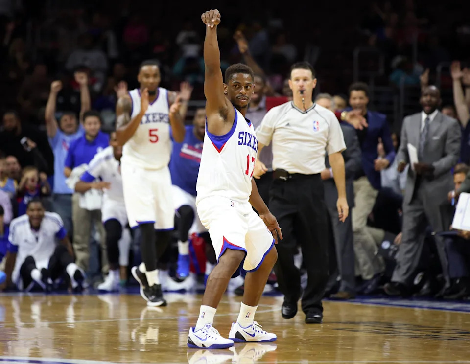 Oct 8, 2014; Philadelphia, PA, USA; Philadelphia 76ers guard Casper Ware (17) reacts after hitting a three quarter court shot at the third quarter buzzer in a game against the Charlotte Hornets at the Wells Fargo Center. The 76ers defeated the Hornets 106-92. Mandatory Credit: Bill Streicher-USA TODAY Sports