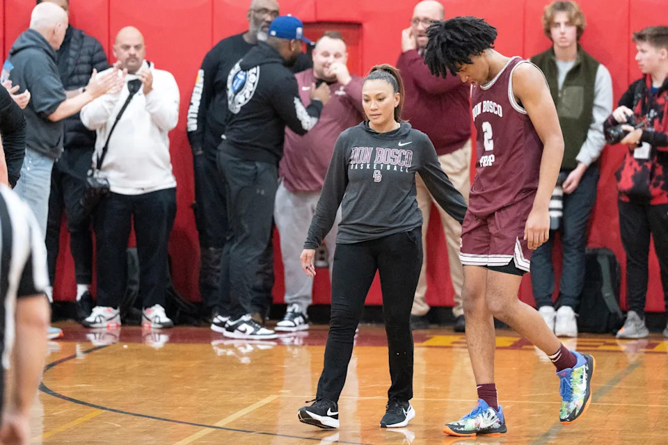 Don Bosco boys basketball at Bergen Catholic on Thursday, January 12, 2023. Don Bosco assistant coach Maria Harper with her son DB #2 Dylan Harper. 