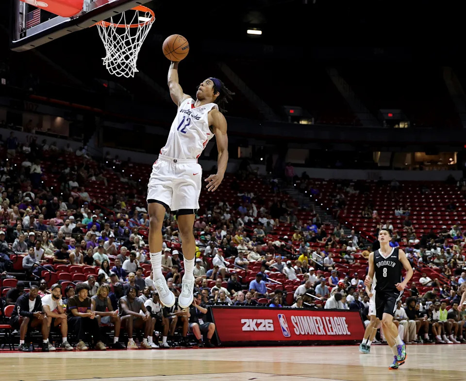 LAS VEGAS, NEVADA - JULY 13: Tre Johnson #12 of the Washington Wizards dunks against the Brooklyn Nets in the second half of a 2025 NBA Summer League game at the Thomas & Mack Center on July 13, 2025 in Las Vegas, Nevada. NOTE TO USER: User expressly acknowledges and agrees that, by downloading and or using this photograph, User is consenting to the terms and conditions of the Getty Images License Agreement. (Photo by Ethan Miller/Getty Images)