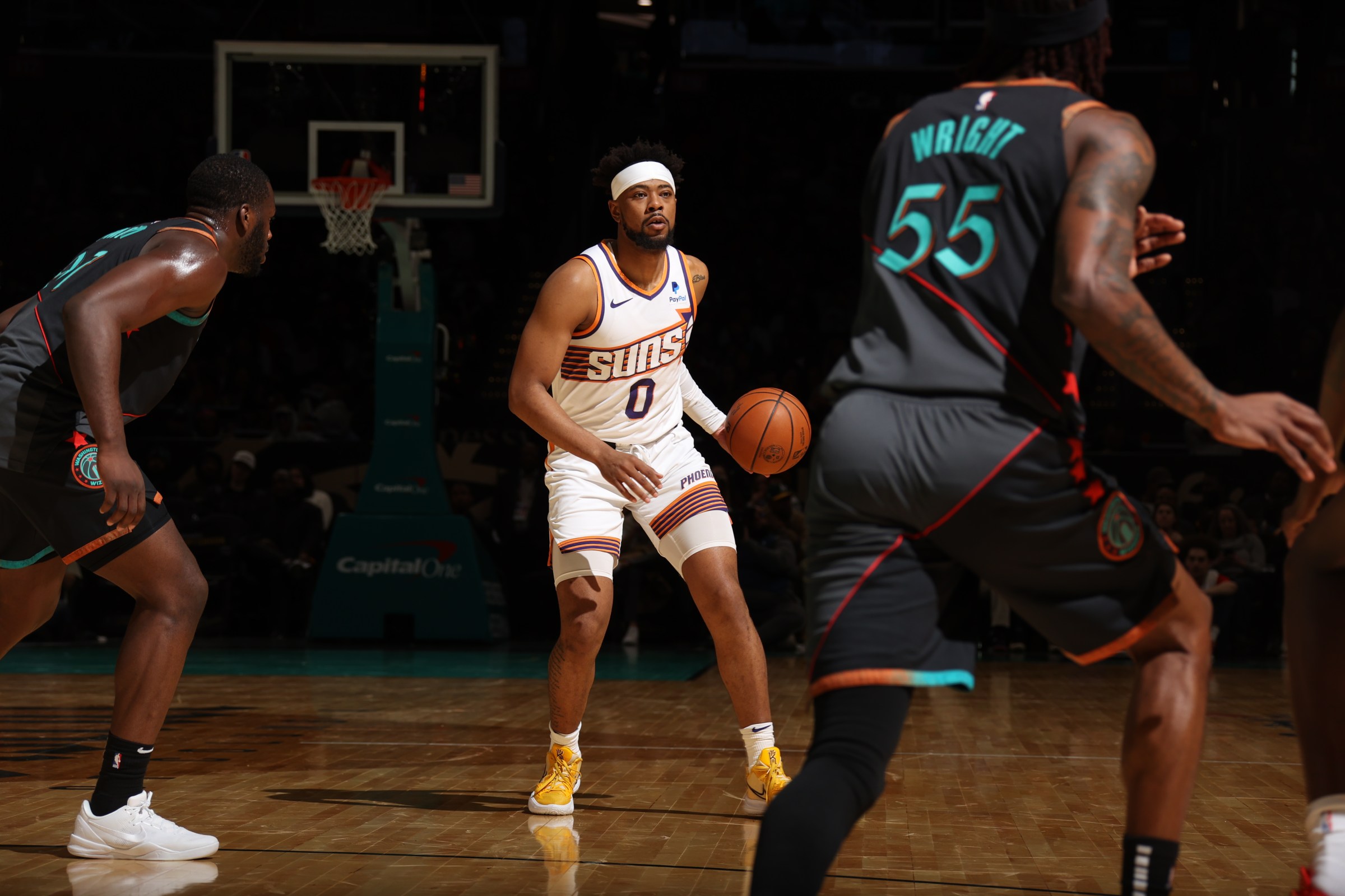 WASHINGTON, DC - FEBRUARY 4: Jordan Goodwin #0 of the Phoenix Suns handles the ball during the game against the Washington Wizards on February 4, 2024 at Capital One Arena in Washington, DC. NOTE TO USER: User expressly acknowledges and agrees that, by downloading and or using this Photograph, user is consenting to the terms and conditions of the Getty Images License Agreement. Mandatory Copyright Notice: Copyright 2024 NBAE (Photo by Stephen Gosling/NBAE via Getty Images)