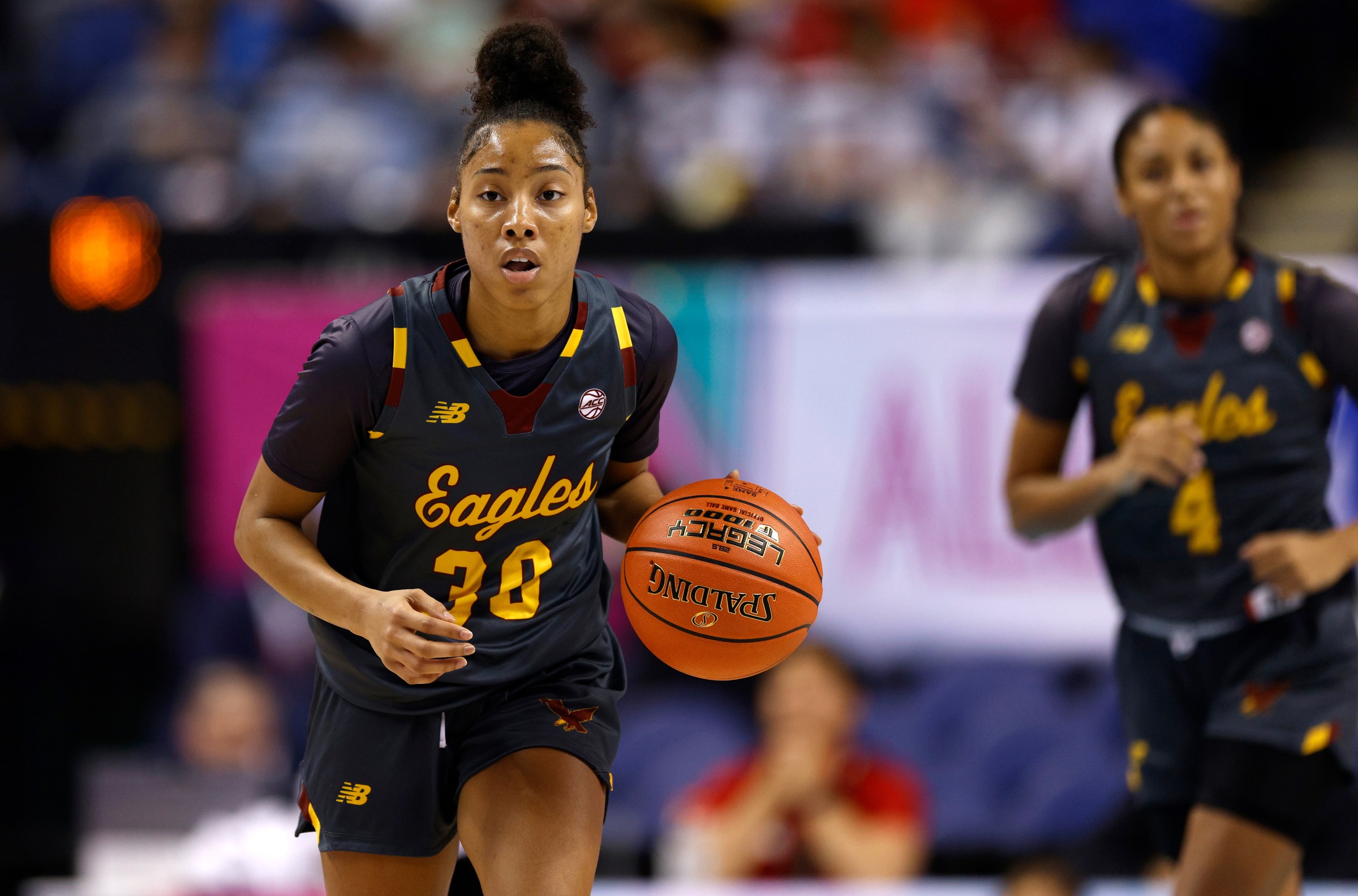 GREENSBORO, NORTH CAROLINA - MARCH 7: T’yana Todd #30 of the Boston College Eagles dribbles up court during the first half of the game against the Louisville Cardinals in the Second Round of the ACC Women’s Basketball Tournament at Greensboro Coliseum on March 7, 2024 in Greensboro, North Carolina. (Photo by Lance King/Getty Images)