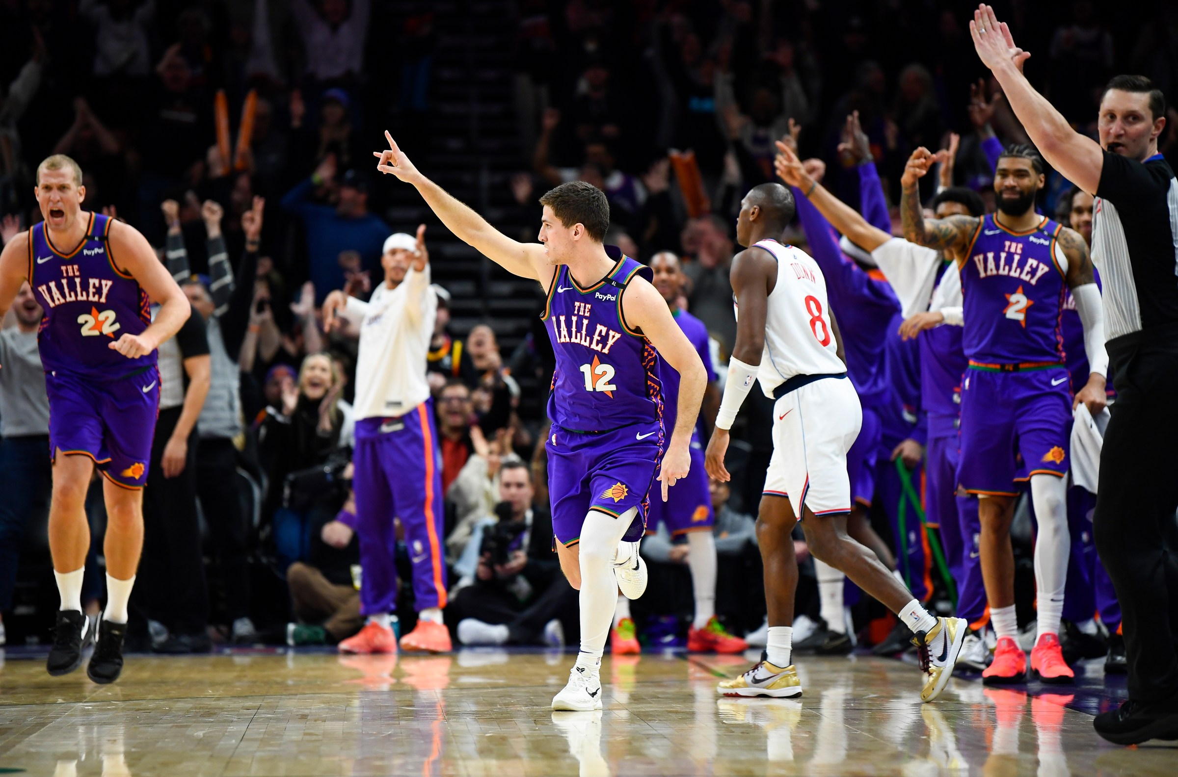 PHOENIX, ARIZONA - MARCH 04: Collin Gillespie #12 of the Phoenix Suns reacts after scoring a three-point shot during the second half against the Los Angeles Clippers at PHX Arena on March 04, 2025 in Phoenix, Arizona. NOTE TO USER: User expressly acknowledges and agrees that, by downloading and or using this photograph, User is consenting to the terms and conditions of the Getty Images License Agreement. (Photo by Kelsey Grant/Getty Images)