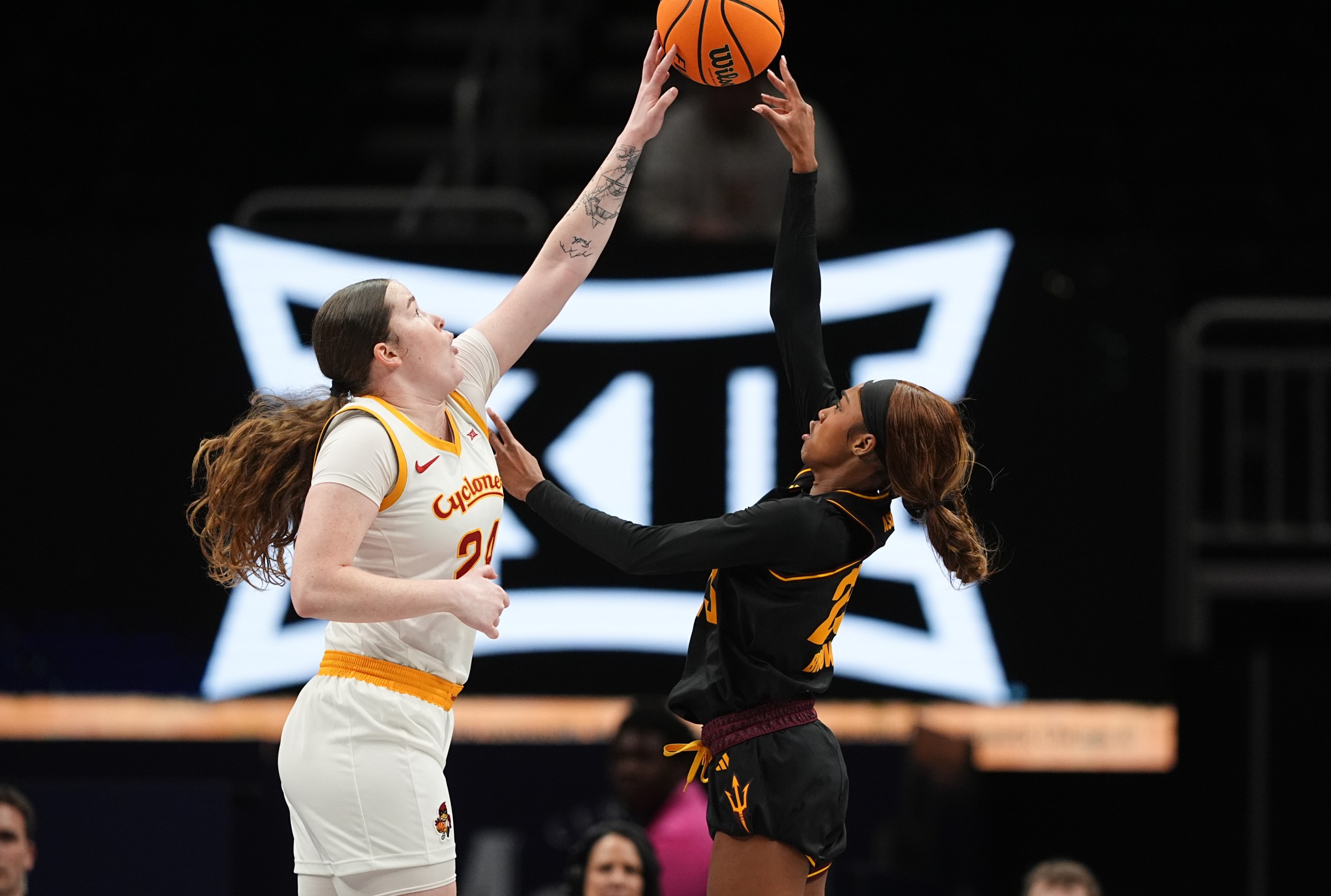 KANSAS CITY, MISSOURI - MARCH 6: Addy Brown #24 of the Iowa State Cyclones blocks the shot attempt by Jalyn Brown #23 of the Arizona State Sun Devils in the second round of the women’s Big 12 Championship at T-Mobile Center on March 6, 2025 in Kansas City, Missouri. (Photo by Kyle Rivas/Getty Images)