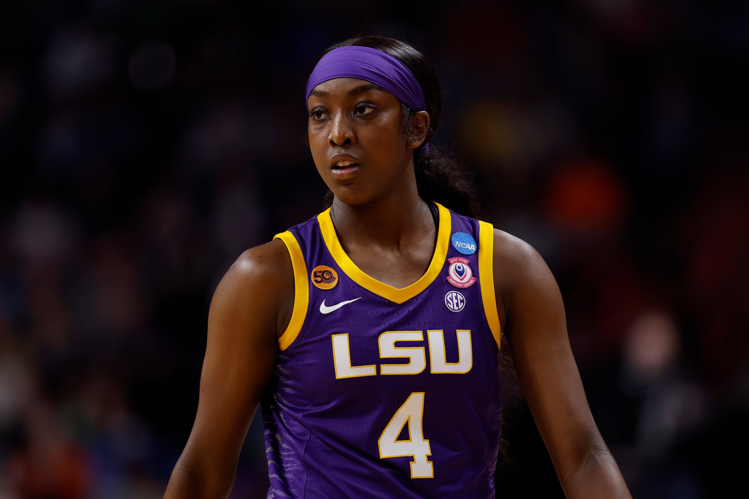 SPOKANE, WASHINGTON - MARCH 30: Flau’Jae Johnson #4 of the LSU Lady Tigers looks on against the UCLA Bruins during the first quarter in the Elite Eight round of the NCAA Women’s Basketball Tournament at Spokane Arena on March 30, 2025 in Spokane, Washington. (Photo by Alika Jenner/Getty Images)