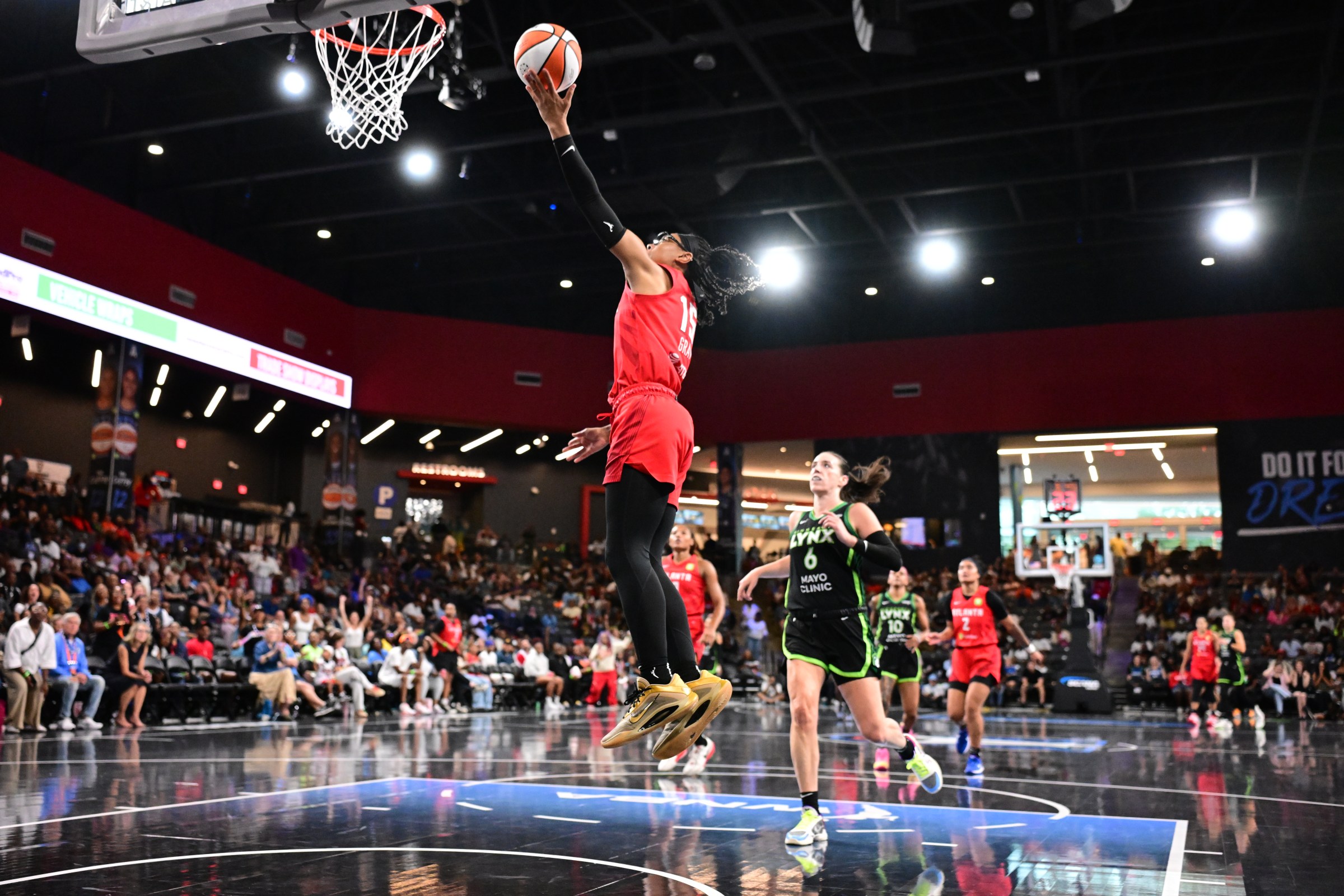 ATLANTA, GA - AUGUST 21: Allisha Gray #15 of the Atlanta Dream drives to the basket during the game against the Minnesota Lynx on August 21, 2025 at Gateway Center Arena at College Park in Atlanta, Georgia. NOTE TO USER: User expressly acknowledges and agrees that, by downloading and or using this photograph, User is consenting to the terms and conditions of the Getty Images License Agreement. Mandatory Copyright Notice: Copyright 2025 NBAE (Photo by Adam Hagy/NBAE via Getty Images)