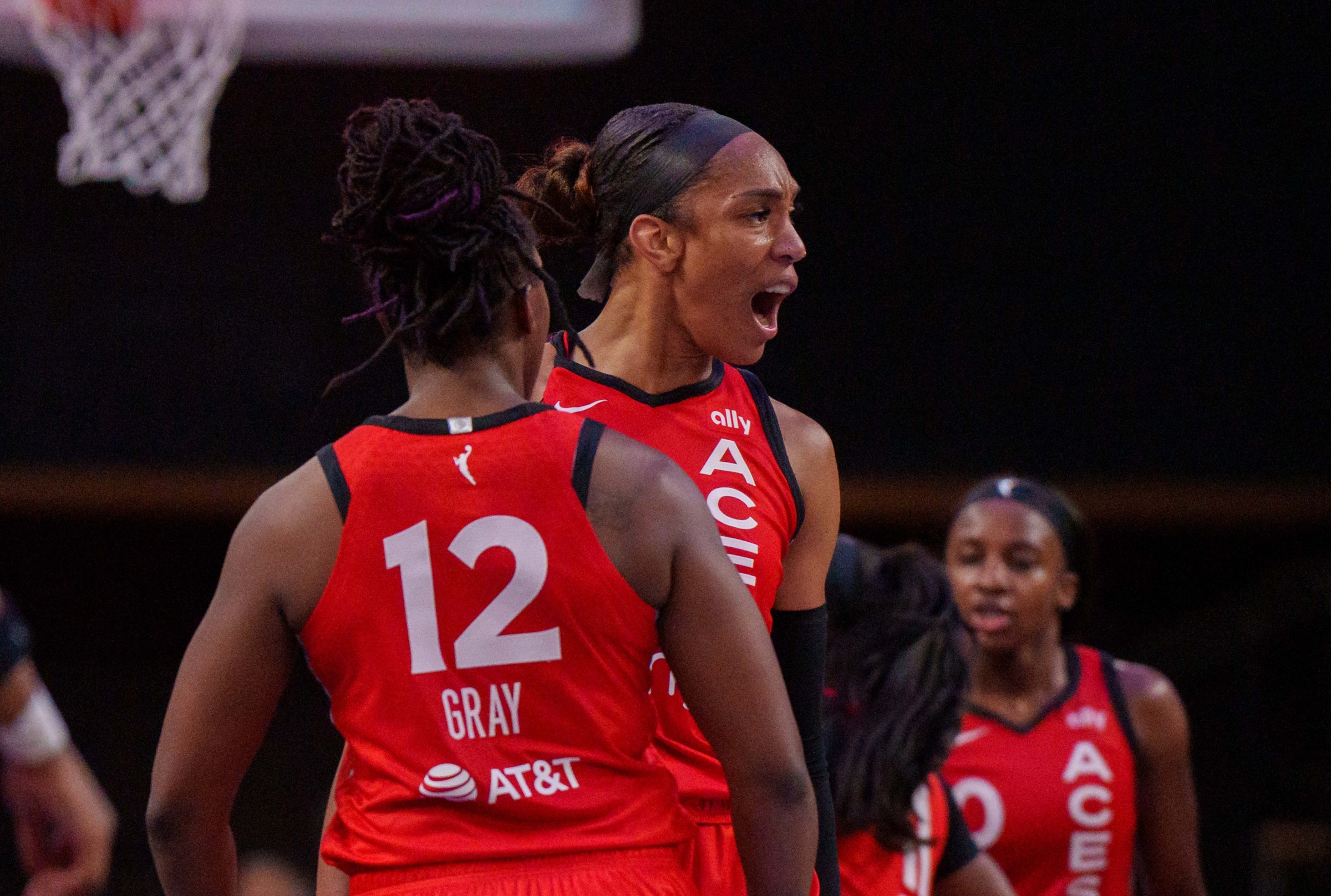 COLLEGE PARK, GEORGIA - AUGUST 27: A’ja Wilson #22 of the Las Vegas Aces and Chelsea Gray #12 of the Las Vegas Aces celebrate a basket during a game between the Las Vegas Aces and Atlanta Dream at Gateway Center Arena on August 27, 2025 in College Park, Georgia. NOTE TO USER: User expressly acknowledges and agrees that, by downloading and or using this photograph, User is consenting to the terms and conditions of the Getty Images License Agreement. (Photo by Andrew J. Clark/ISI Photos/ISI Photos via Getty Images)