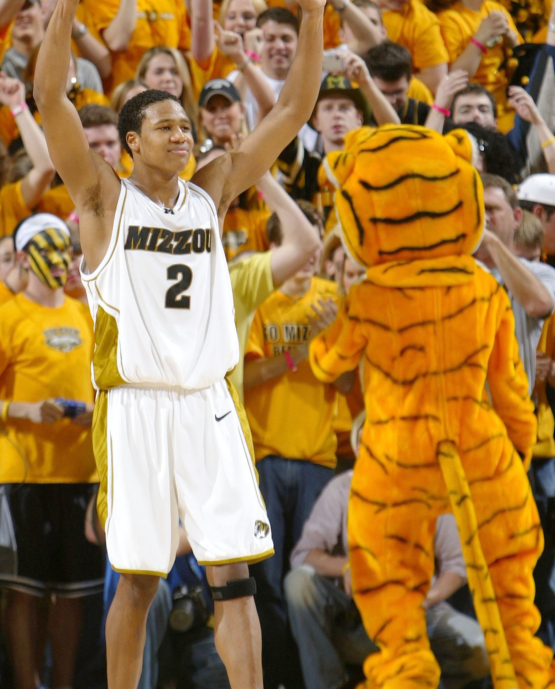 COLUMBIA, MO - MARCH 6: Jason Conley #2 of Missouri gestures as he celebrates Missouri defeating Kansas on March 6, 2005 at Mizzou Arena in Columbia, Missouri. The Missiouri Tigers defeated the Kansas Jayhawks 72-68. (Photo by Elsa/Getty Images)