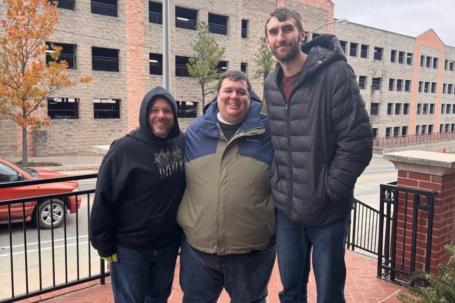 Craig Morency and his brother, Scott Morency, with Luke Kornet outside of a church in Oklahoma City in January of 2025